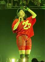 Billie Eilish performs a live performance in an erotic costume