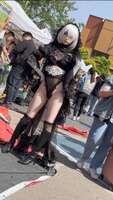 [Image] Cosplayer is photographed from a low angle at an event