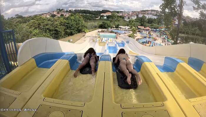 [Image] A bratty boy gets glued to the butt of a swimsuit high school girl while waiting for his turn on a water slide. 5th image