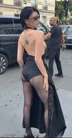 Eight-head-tall model Ayaka Miyoshi looks sharp with her back tattoo and chest reveal in Paris lol