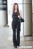 [Image] Sana appears in a perfectly tailored black camisole and black pants that show off her body line