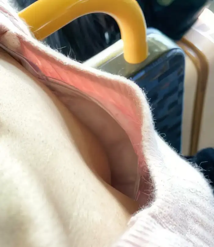 98 amateur cleavage erotic images: A collection of hidden camera footage of ordinary women whose cleavage is too visible 13th image