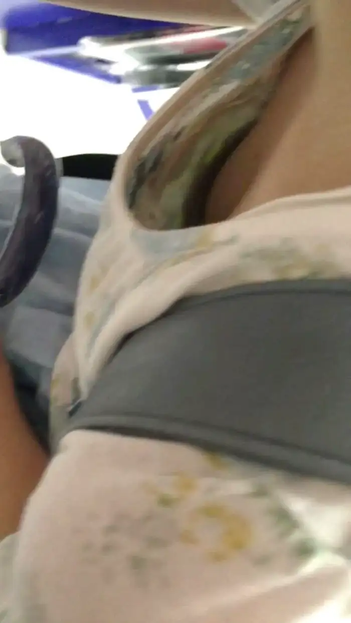 98 amateur cleavage erotic images: A collection of hidden camera footage of ordinary women whose cleavage is too visible 70th image