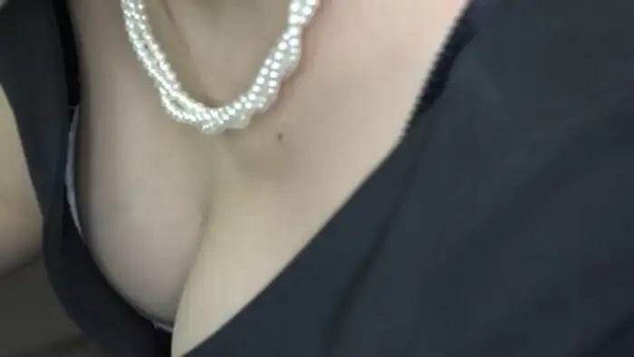 98 amateur cleavage erotic images: A collection of hidden camera footage of ordinary women whose cleavage is too visible 91th image