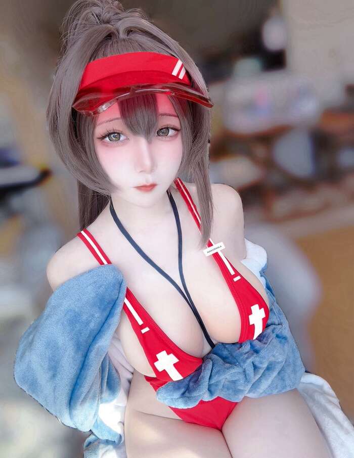 'NIKKE' Swimsuit Marchana C108 Images of a Busty Cosplayer Trending at Comiket and Taiwan FF 8th image